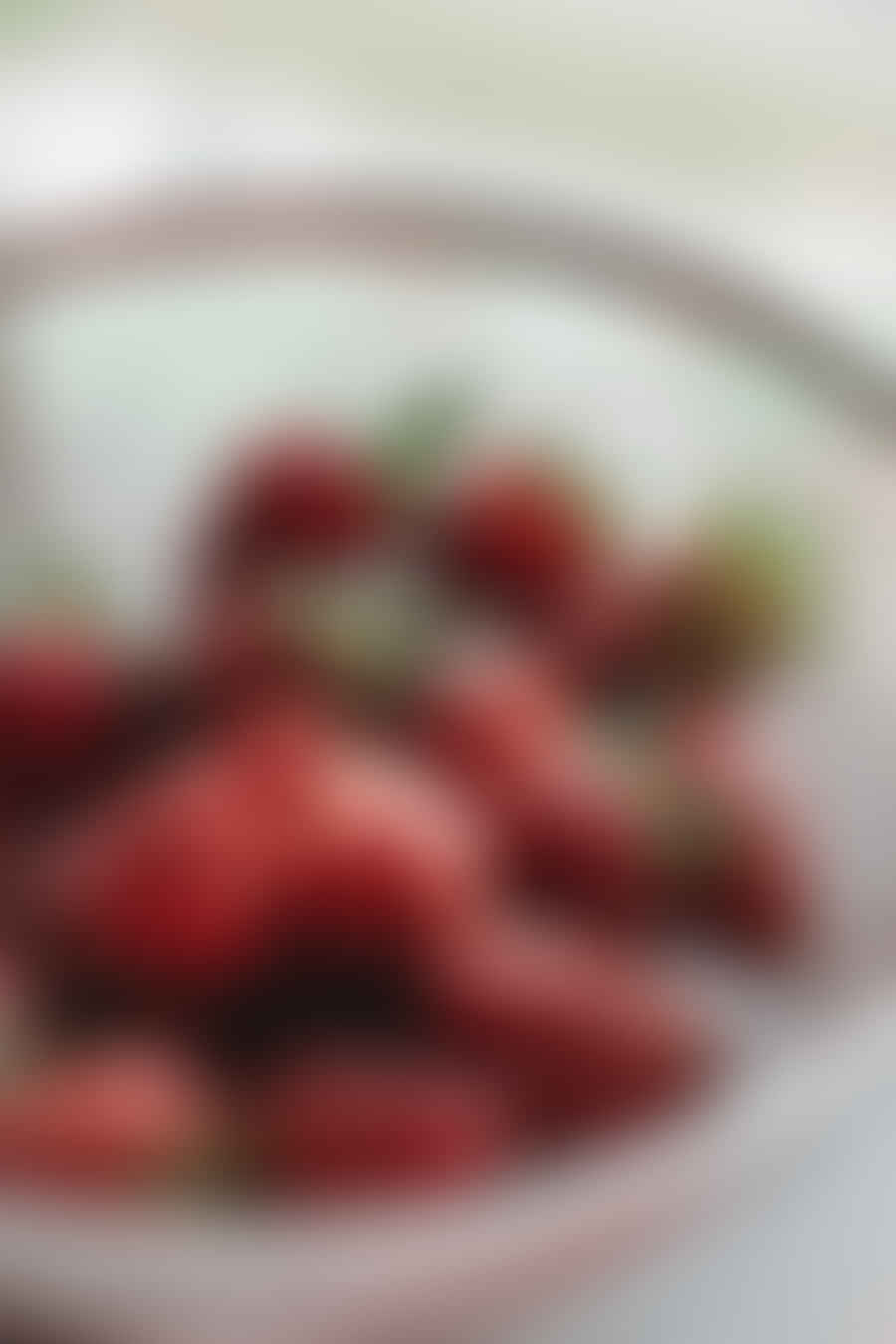 Bowl of oatmeal with fresh fruit and nuts